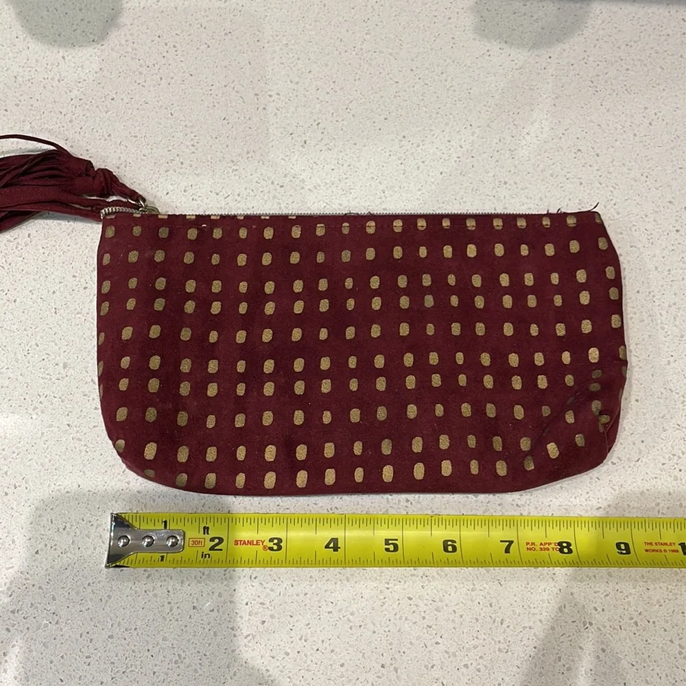 Kit & Luc maroon gold suede tassel zip cosmetics bag